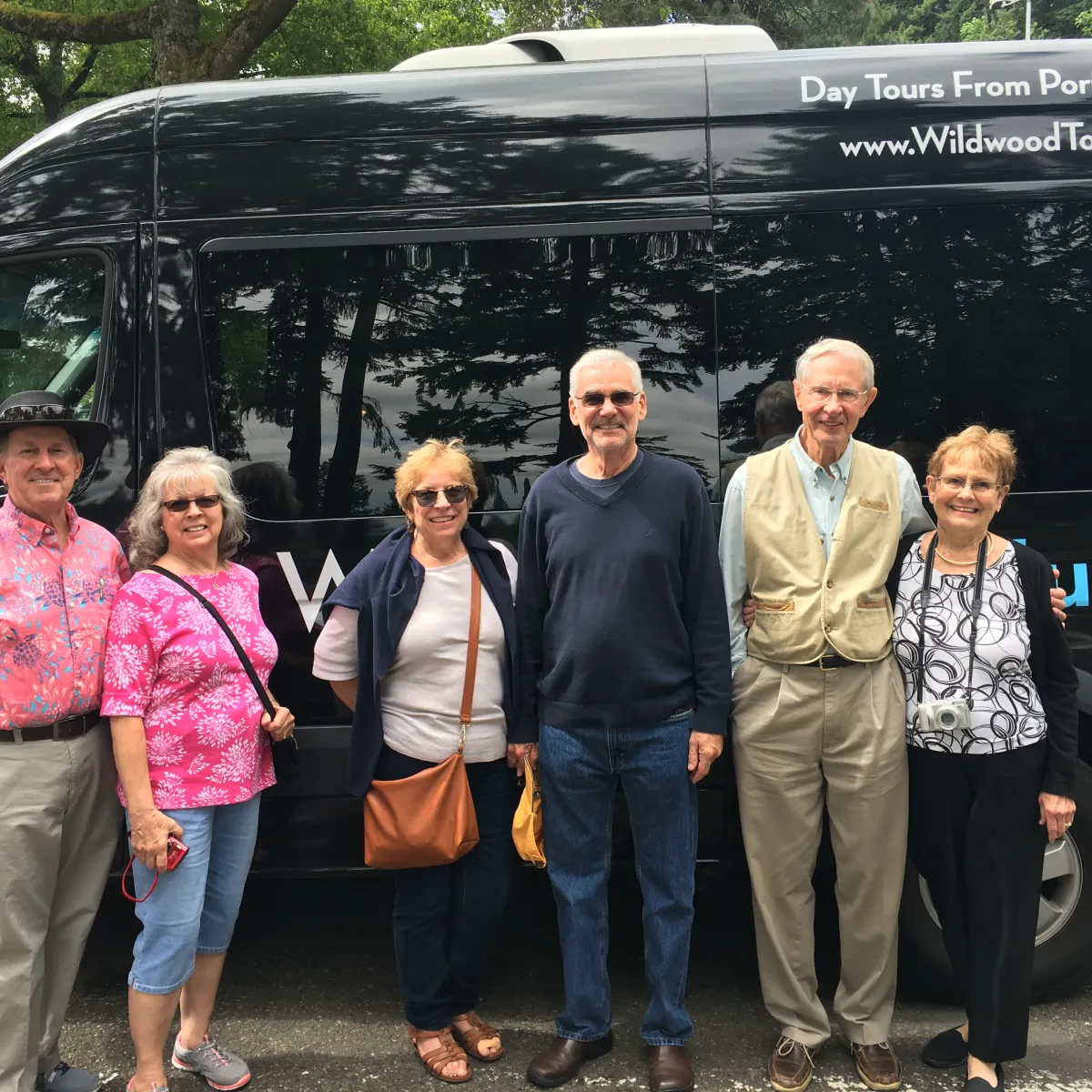 a group of people posing for the camera