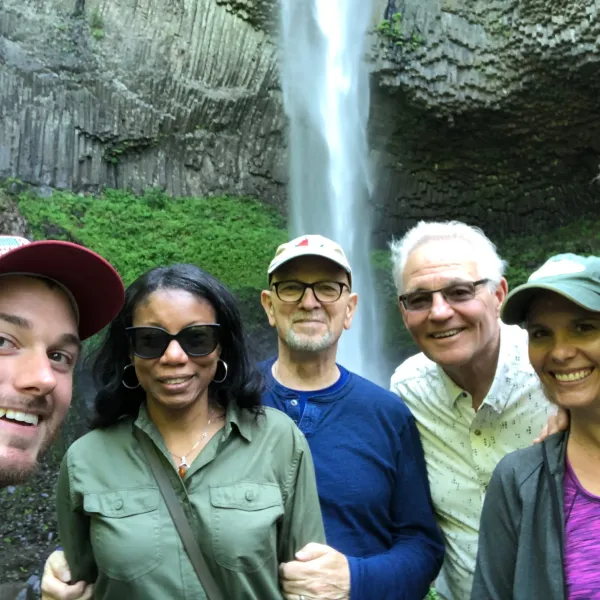 a group of people posing for the camera